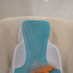Secure bathing with pediatric bath seat and anchor tub chair